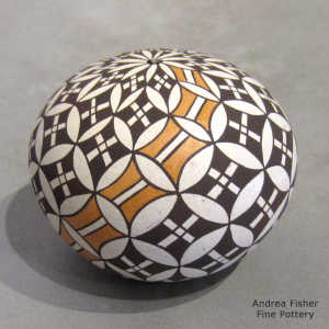 Geometric design on a polychrome seed pot