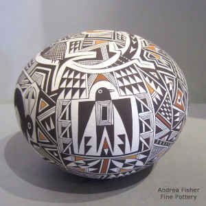 Mimres-style animals, insects and geometric design on a polychrome seed pot