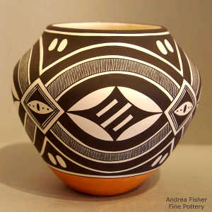 Rainbow, medallion, fine line and geometric design on a polychrome jar
