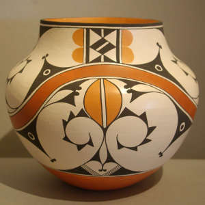 Rainbow and geometric design on a polychrome jar