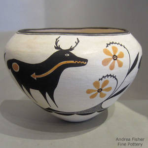 Flower, deer and heart-line design on a polychrome jar