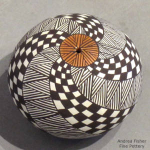Fine line, checkerboard and swirl design on a polychrome seedpot