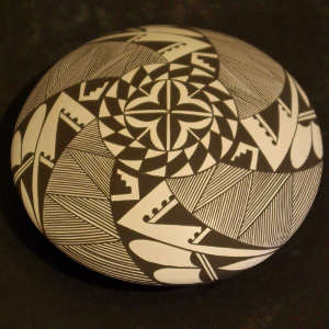 Fine line and geometric designs on a black and white seedpot