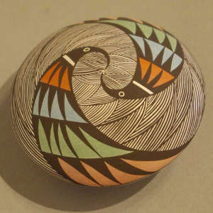 Interlocking bird, fine line and geometric design on a polychrome seed pot