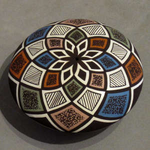 Geometric design on a polychrome seedpot