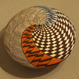 Swirl, fine line and geometric design on a polychrome seedpot
