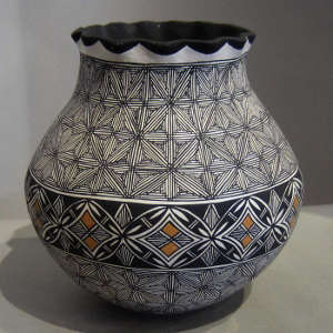 Fine line design and pie crust rim on a polychrome jar