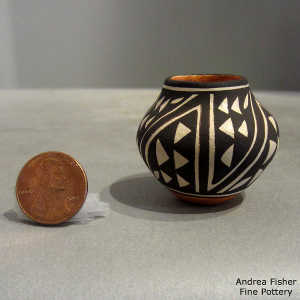 Geometric design on a miniature polychrome jar