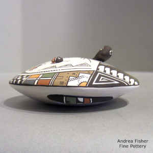 Lizard, fine line and geometric design on a polychrome seed pot