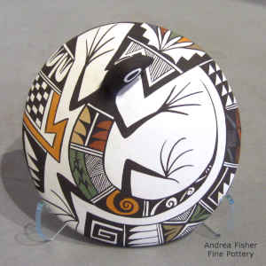 Lizard and geometric design on a miniature polychrome seed pot