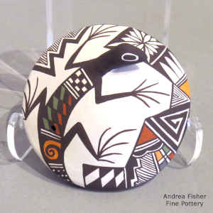 Lizard and geometric design on a miniature polychrome seed pot