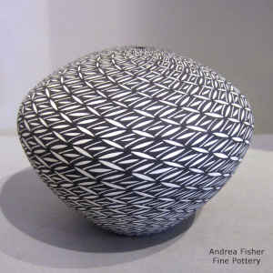 Geometric design on a black and white seed pot