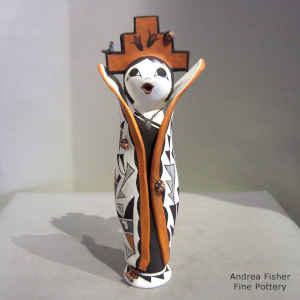 Tablita, butterfly, bird, lady bug and a geometric design on a polychrome Corn Maiden