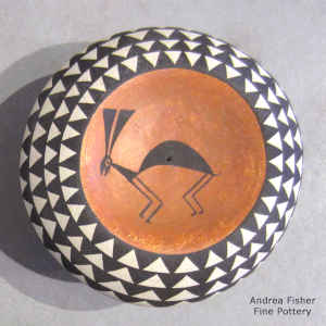 Mimbres rabbit and geometric design on a miniature polychrome seed pot