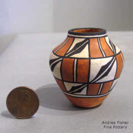 Geometric design on a miniature polychrome pot