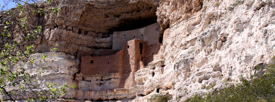 Looking up at the stack architecture of Montezumas Castle, built into an alcove in the cliff