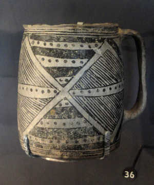 Black geometric design on a Mancos grey mug with a handle