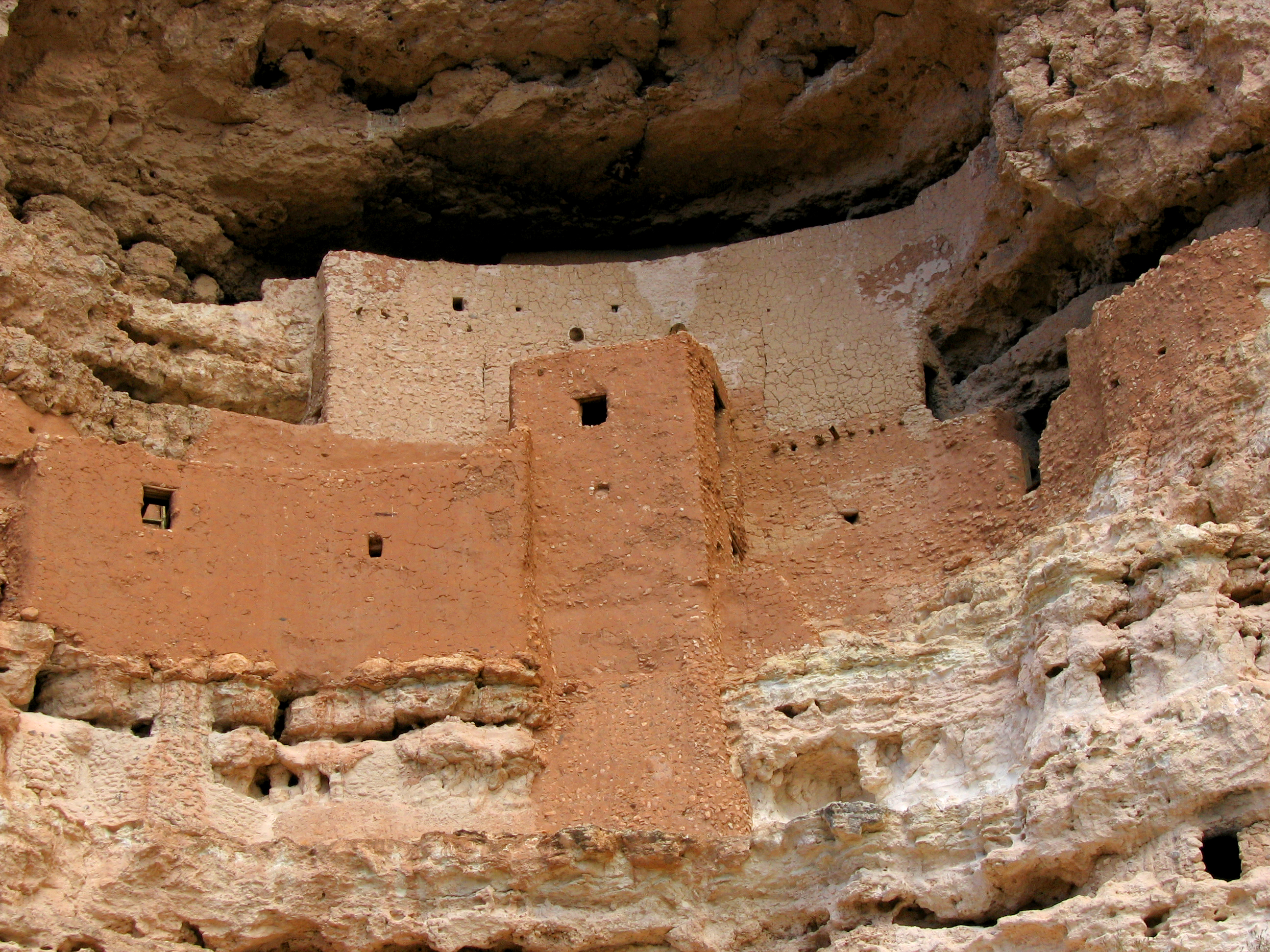 Looking up at the ancient stone architecture structure of Montezuma Castle