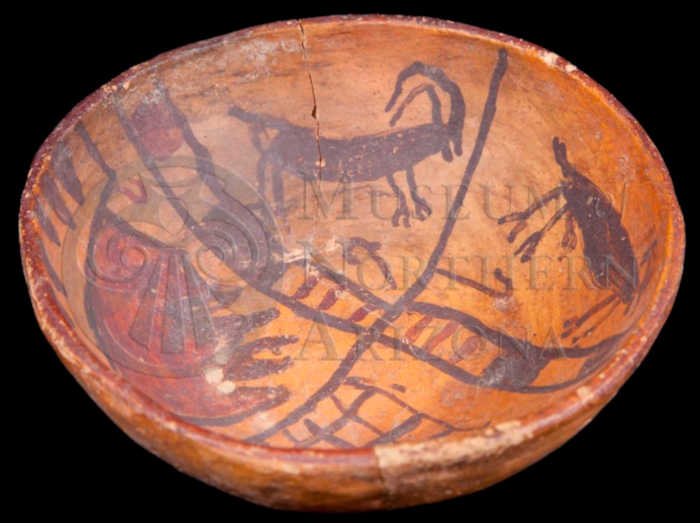 A reassembled Payupki Polychrome bowl with animal and geometric designs inside