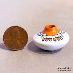 4-panel feather and geometric design on a miniature polychrome jar