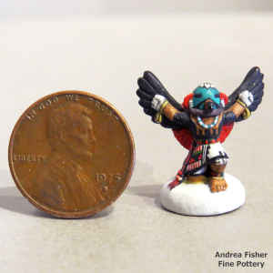 Polychrome miniature masked dancer figure