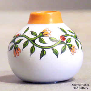 Polychrome miniature jar with a branch, flower and lady bug design