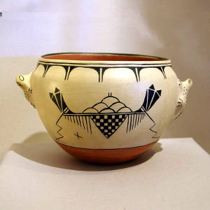 Cloud, rain and geometric design on a polychrome jar with frog handles