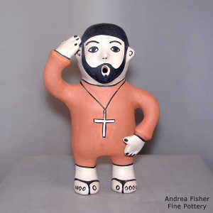 Cross on a polychrome Singing Priest figure