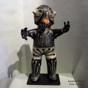 Polychrome circus performer figure with two faces