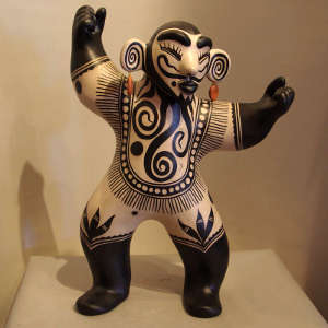 Pierced and tattooed circus performer figure