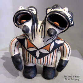 A polychrome two-headed opera singer