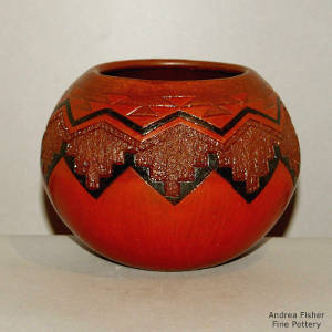 Dineh rug design on a brown jar