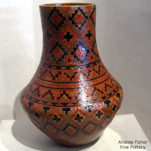 Dineh carpet design on a polychrome jar