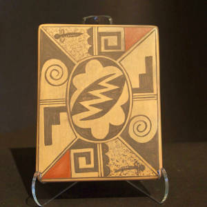 Shard design on a polychrome tile