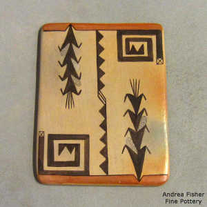 Corn plant, kiva step and geometric design on a polychrome tile