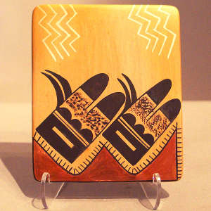 Bird element geometric design on a polychrome tile