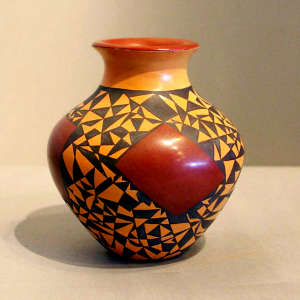 Medallion and geometric design on a polychrome jar