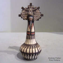 Carved, painted and formed jar with a katsina wearing a tablita lid