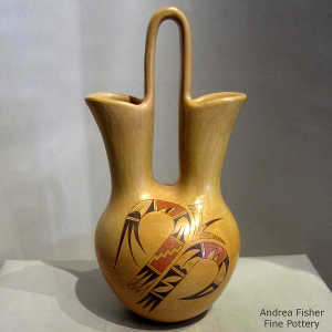 Eagle feather, bird element and geometric design on a polychrome wedding vase