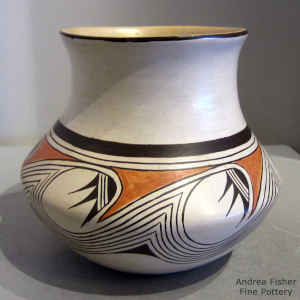 Stylized migration pattern design on a polychrome jar