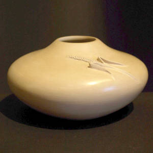 Ear of corn relief on a buff-colored jar