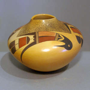 Four panel stylized bird design on a polychrome jar