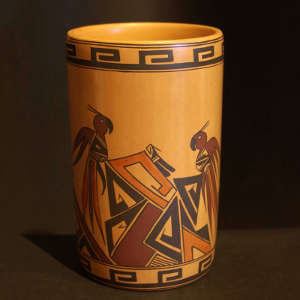 Contemporary bird and geometric design on a polychrome yellow ware cylinder