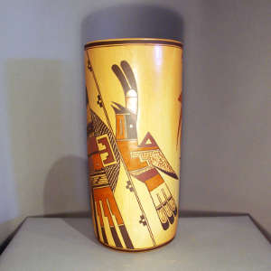 Polychrome bird element and geometric design on a yellow ware cylinder