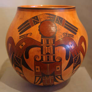 Bird elements and geometric designs on a polychrome jar