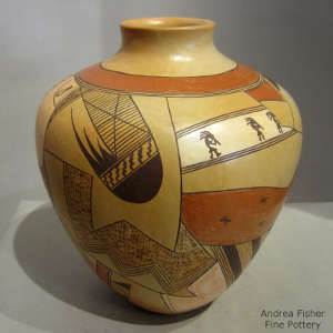 Red and black bird element, moth, flute player and geometric design on a yellow ware jar with white slip