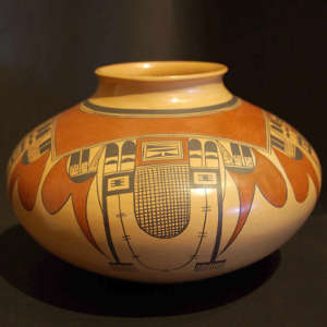 Bird element and geometric design on a polychrome yellow ware jar