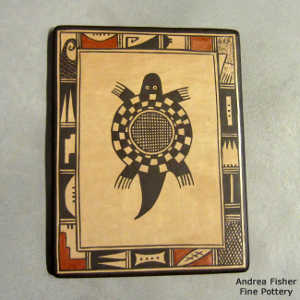 Turtle and shard design on a polychrome tile