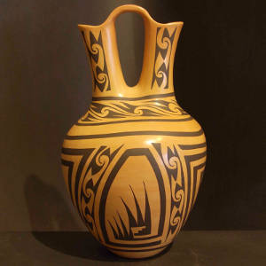 Black Nampeyo design on a yellow ware wedding vase