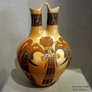 Thunderbird and geometric design on a polychrome wedding vase